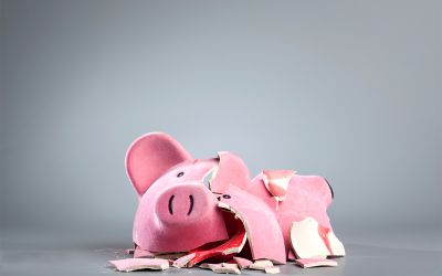 Photo of a broken piggy bank to illustrate the article, Should We Worry About Growing World Debt?