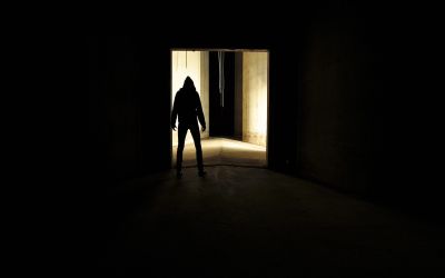 Photo of a shadowy figure in a distant doorway to illustrate the article Villains of the Bible