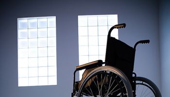 Empty wheelchair representing 